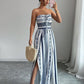 👗 50% OFF NOW! 💥 Geometric Jumpsuit with Halter Neckline & Side Slit – Unique print & elastic back – Versatile, perfect for summer parties or resort wear ✨