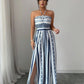 👗 50% OFF NOW! 💥 Geometric Jumpsuit with Halter Neckline & Side Slit – Unique print & elastic back – Versatile, perfect for summer parties or resort wear ✨