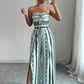 👗 50% OFF NOW! 💥 Geometric Jumpsuit with Halter Neckline & Side Slit – Unique print & elastic back – Versatile, perfect for summer parties or resort wear ✨